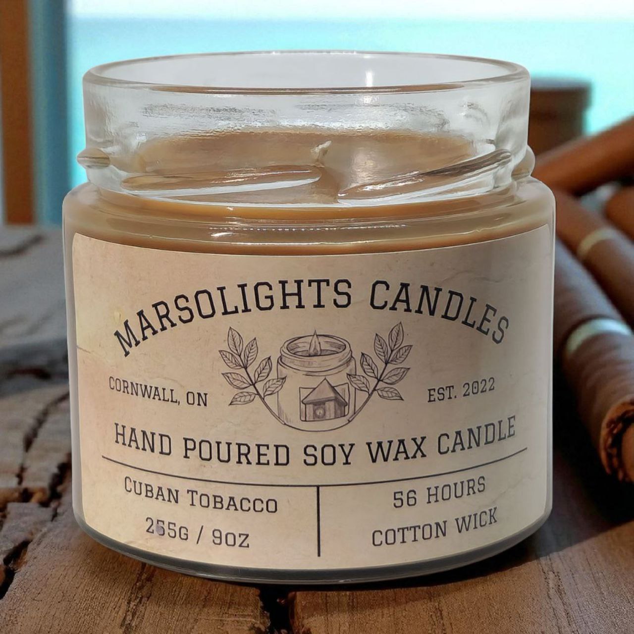 Marsolights Candles jar with label on a wooden surface.
Candle Size: 225 grams or 9 ounces
Burn time: 56 hours
Wick Type: Cotton
Scent: Cuban Tobacco
Made in Ontario Canada