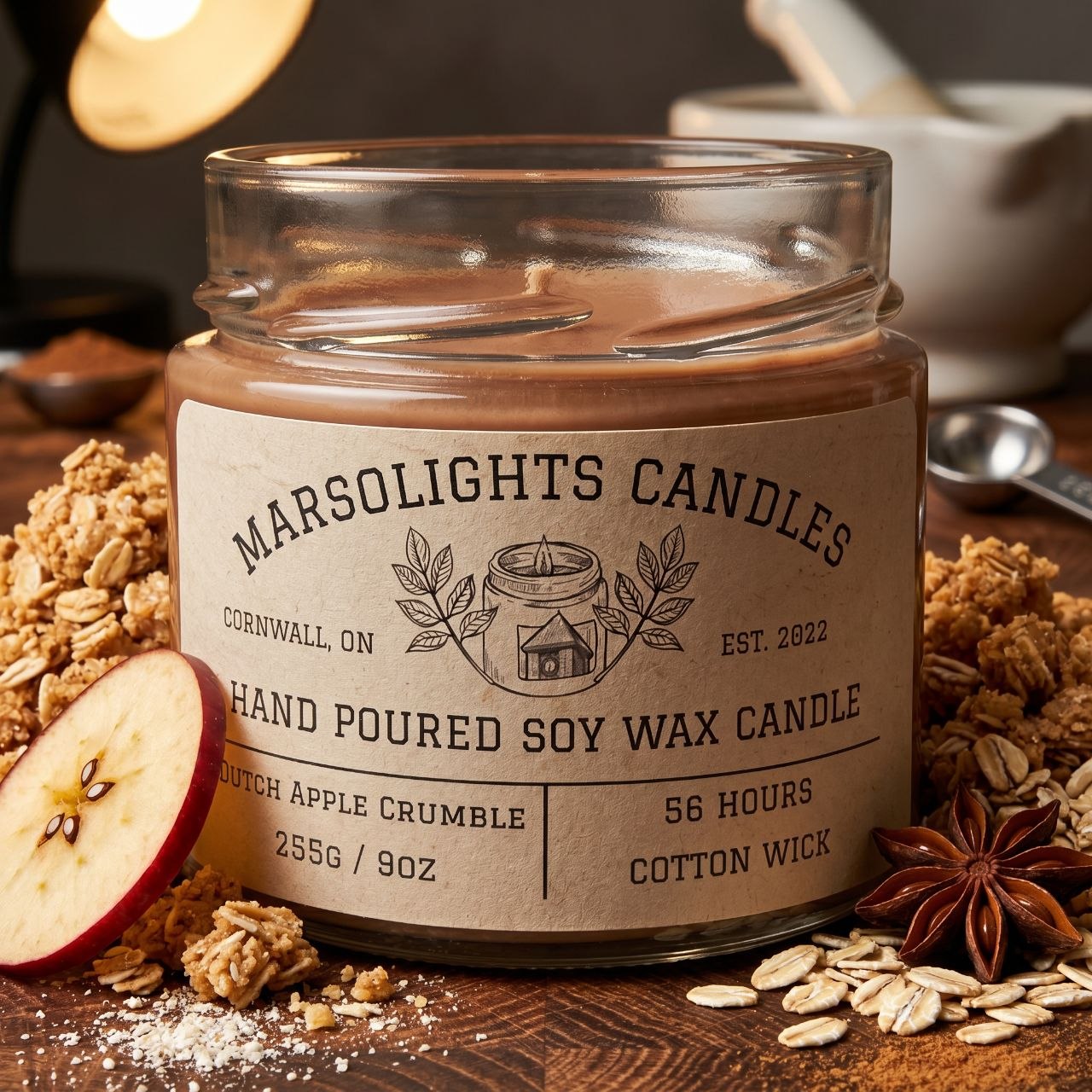Dutch Apple Crumble Soy Candle on a table with apple slice and spices around it. Made in Canada. Cotton wick. 56 hour estimated burn time. $19.99
Fragrance notes:
Baked Apples, Vanilla Bean, Cinnamon, Sugar and Nutmeg.
Size: 9 ounces or 255 grams.