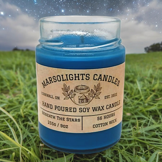 Scented Soy candle beneath the stars. Scented  notes of rose,plum,, and grape. Paraben free oils. Made in Candle Yankee like. 