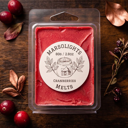 A package of Marsolights Cranberries Melts in a clear plastic clamshell container, placed on a dark wooden surface with scattered cranberries and autumn leaves around it. 
Each cube has about 6-8 hours of Aroma release for 1 room. 
Product Size: 80 grams or 2.8 ounces. 
Scent: Cranberry, Wax Type: Soy