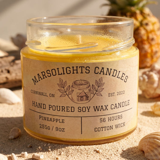 Pineapple Soy Candle, a tropical getaway in a jar. This juicy scent opens with ripe pineapple and banana, followed by bright bursts of orange juice and creamy piña colada. It all wraps up with smooth vanilla and tonka bean for a sun-soaked, feel-good finish. Hand-poured with clean-burning soy wax and premium fragrance oils, it’s perfect for days when you just want to relax, vibe, and pretend you're oceanside. 

Wick type: Cotton
Burn time: 56 Hours
Size: 255g or 9 ounce
Made in Canada
Shipping Available. 