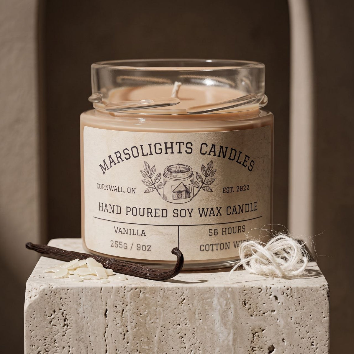 Vanilla candle on a stone pedestal, by Marsolights Candles
Fragrance Notes:
Top: Coconut, Vanilla Crunch
Mid: Cinnamon, Honeyed Soft Butter
Base: Cassia Root, Vanilla Sugar, Tonka Bean
Size: 255 grams or 9 ounces
Burn time: 56 Hours
Paraben Free
Made in Canada